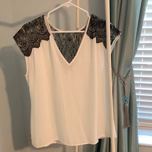 Banana republic size large blouse cream with black lace shoulders and back